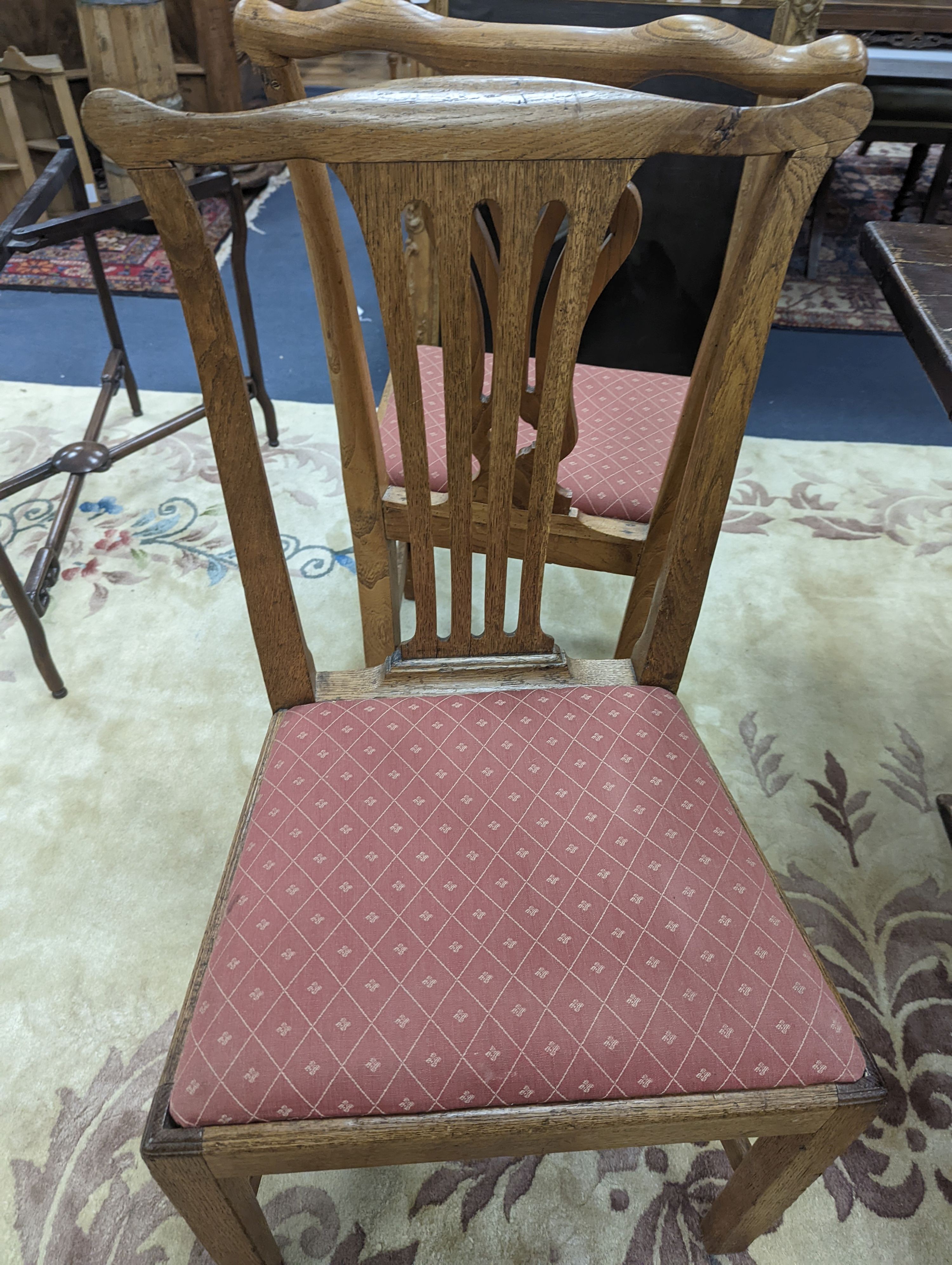 A harlequin set of eight George III provincial oak and elm dining chairs. H-96cm.